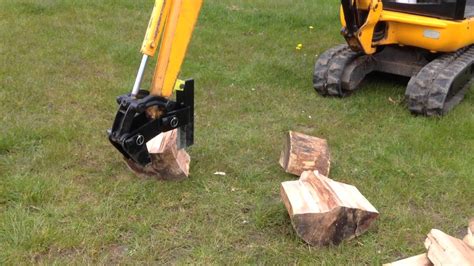 log splitter attachment for mini digger|mini excavator thumb wood splitter.